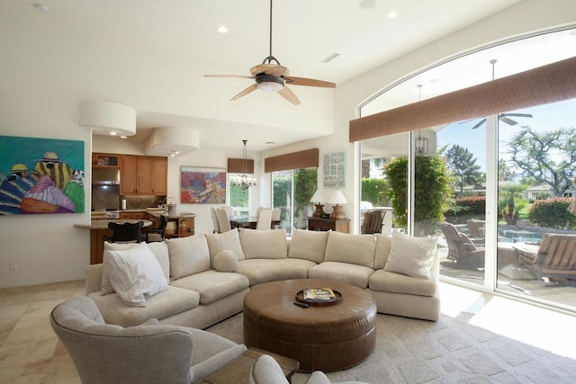 bedroom featuring ceiling fan and light colored carpet