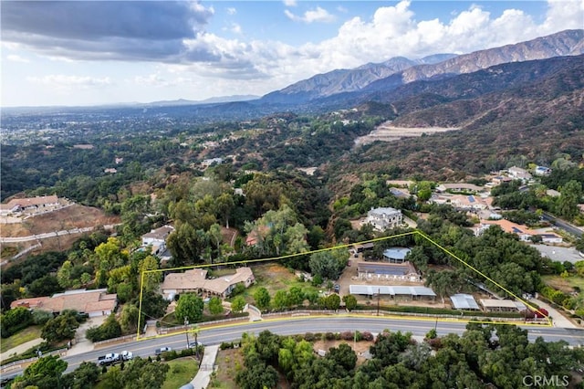 drone / aerial view featuring a mountain view