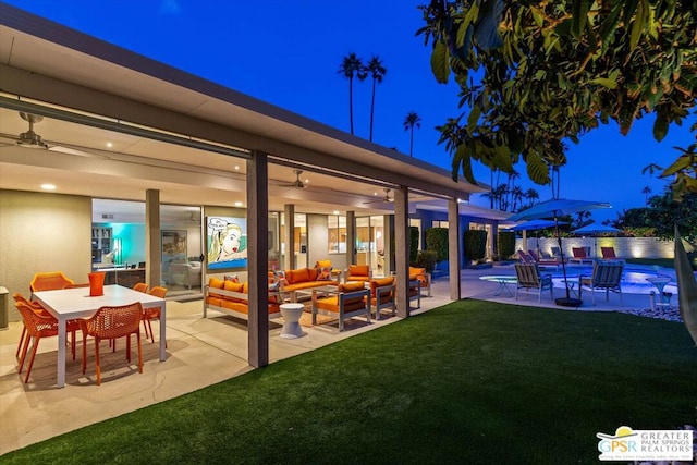 exterior space featuring outdoor lounge area, a yard, a patio, and ceiling fan