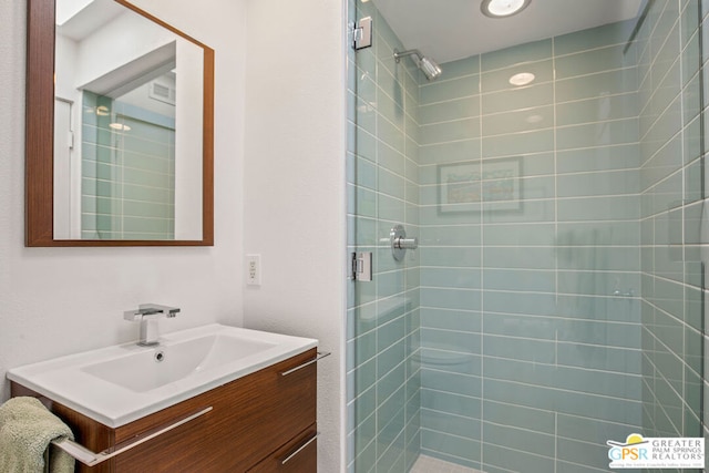 bathroom featuring vanity and walk in shower