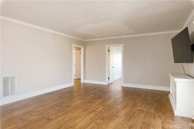 unfurnished living room with hardwood / wood-style floors and ornamental molding