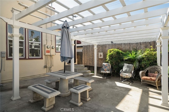 view of patio featuring a pergola