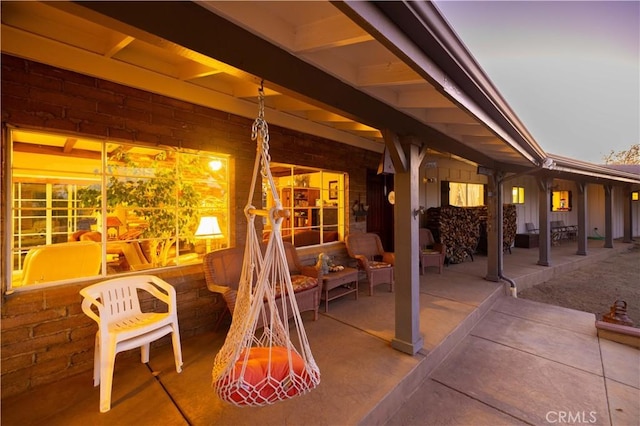 patio terrace at dusk with an outdoor fire pit