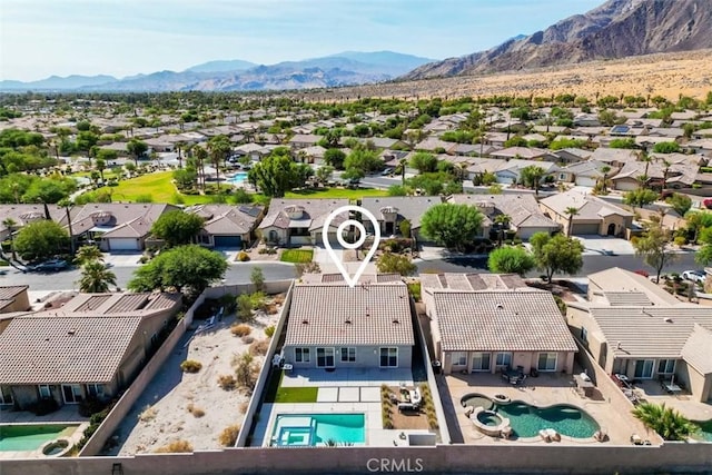 bird's eye view with a mountain view