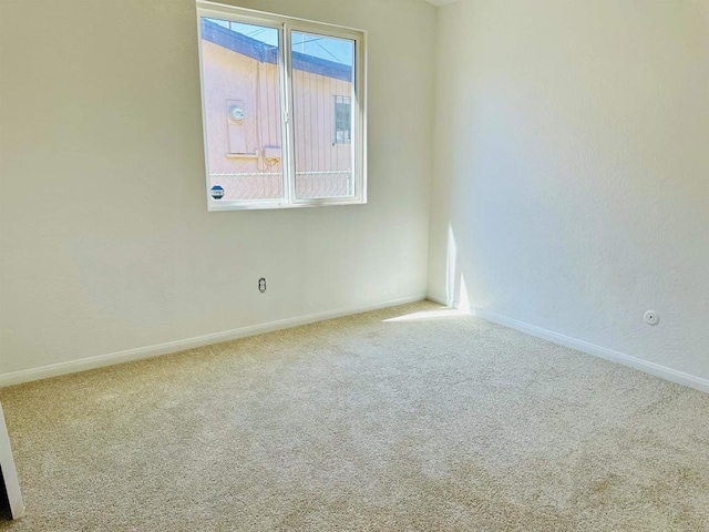 empty room with carpet flooring