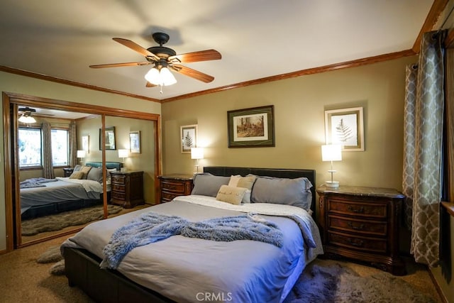 bedroom featuring carpet flooring, a closet, ceiling fan, and ornamental molding