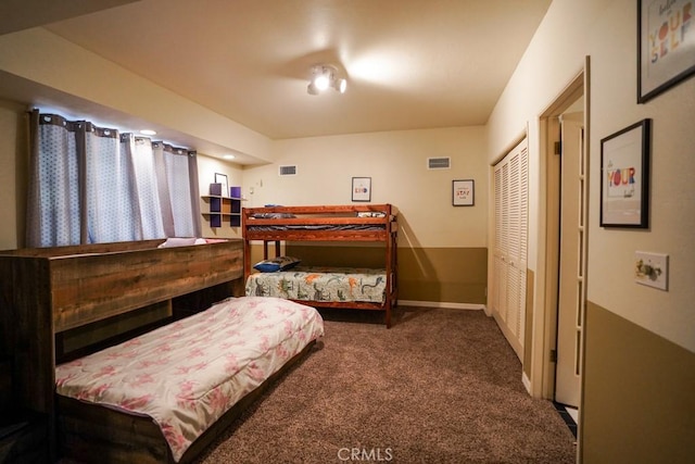 carpeted bedroom with a closet