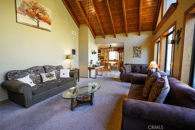 living room with beam ceiling, carpet floors, high vaulted ceiling, and wooden ceiling