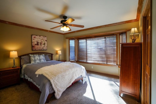 carpeted bedroom with ceiling fan and crown molding