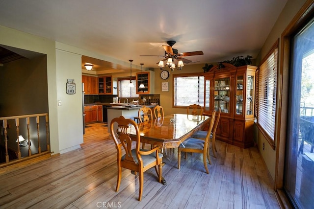 dining space featuring ceiling fan and light hardwood / wood-style floors