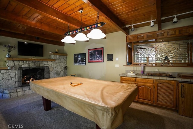 game room with beam ceiling, carpet floors, a fireplace, and billiards