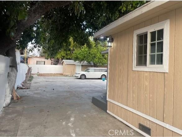 view of property exterior featuring a patio