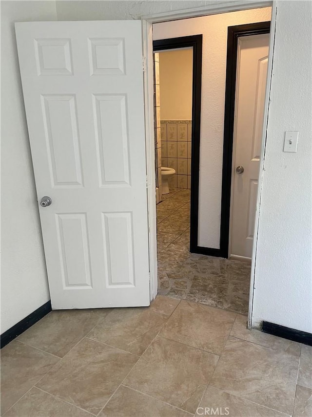 interior space with light tile patterned flooring