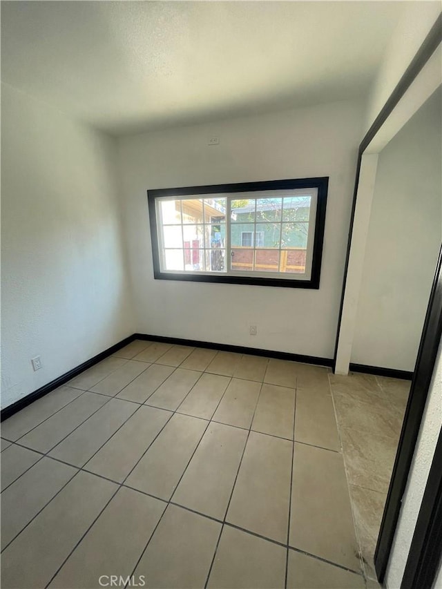 view of tiled empty room