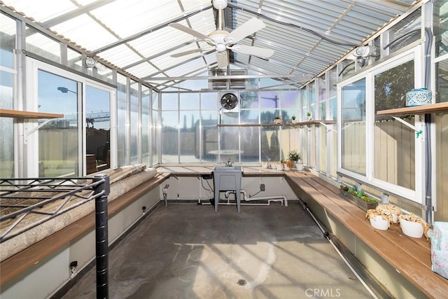 sunroom / solarium with vaulted ceiling and ceiling fan