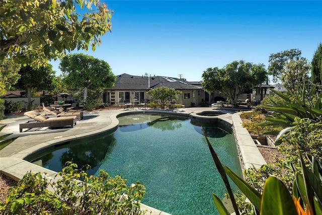 view of pool with a patio area