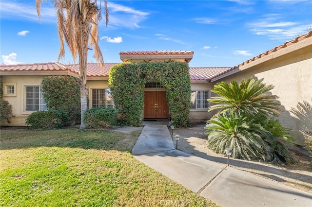 view of front of home with a front yard