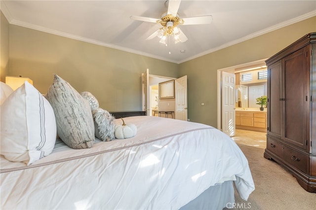 carpeted bedroom with ceiling fan, crown molding, and ensuite bathroom