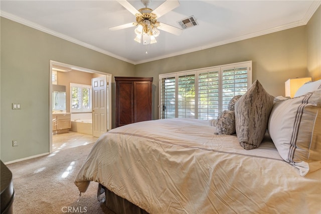 carpeted bedroom featuring connected bathroom, ceiling fan, and crown molding