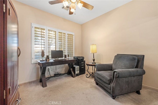 office featuring light carpet, vaulted ceiling, and ceiling fan