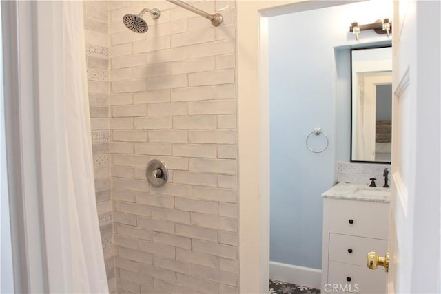 bathroom with vanity and walk in shower