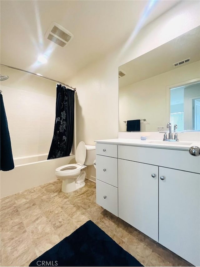 full bathroom featuring vanity, toilet, and shower / bath combo with shower curtain