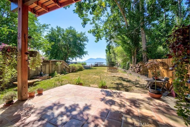 view of patio with a mountain view