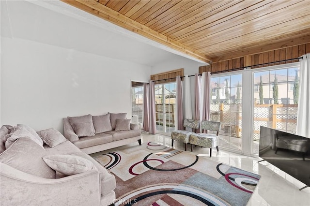 sunroom featuring beamed ceiling and wood ceiling