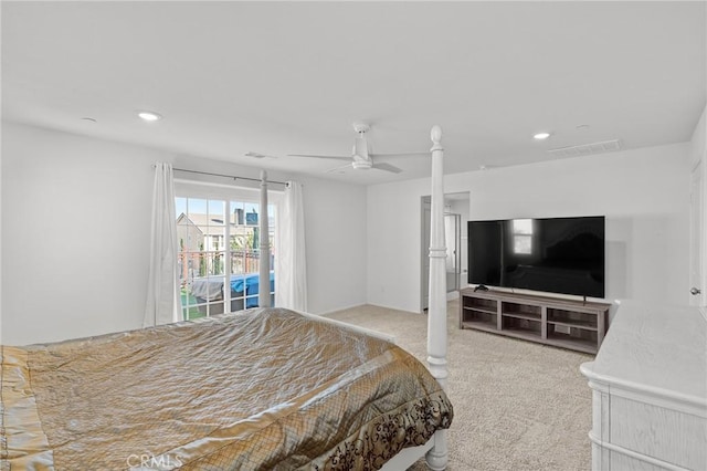 bedroom featuring ceiling fan, access to exterior, and light carpet