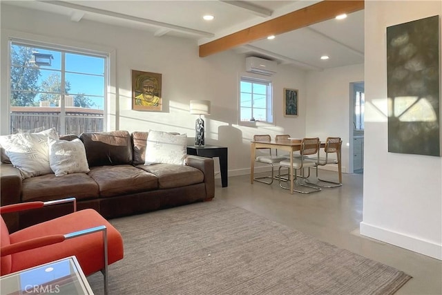 living room with a wall mounted air conditioner, beam ceiling, plenty of natural light, and concrete flooring