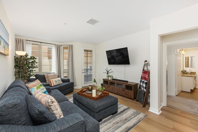 living room with light wood-type flooring