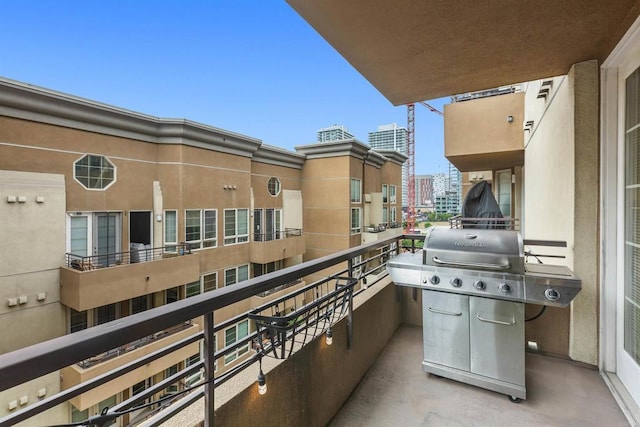 balcony featuring area for grilling