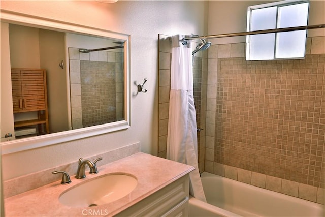 bathroom with vanity and shower / tub combo