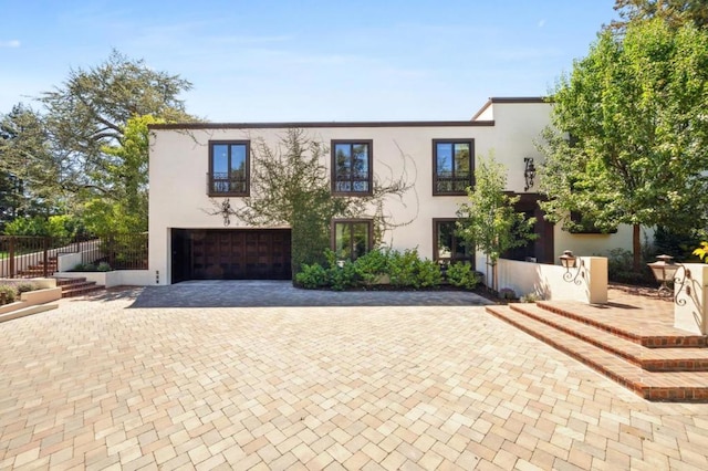 view of front of home with a garage