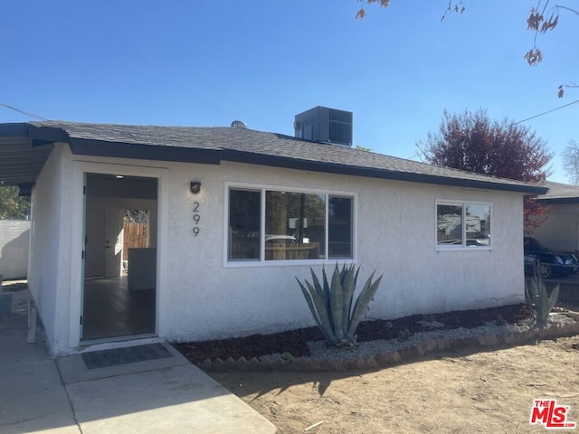 view of front of property featuring central AC unit