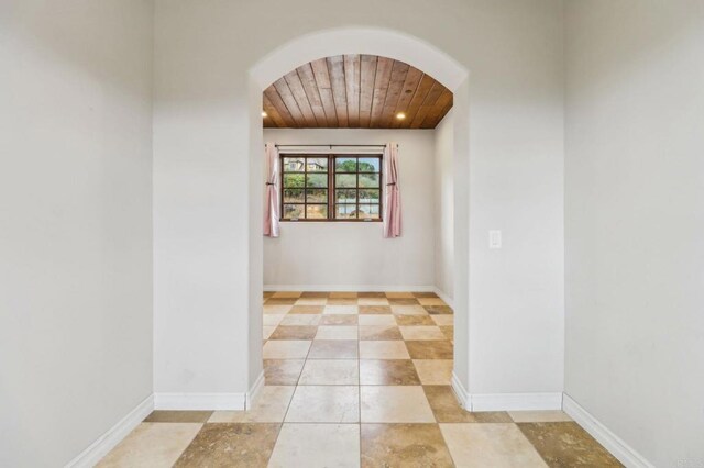 20530 Bexley Rd, Jamul, CA 91935 - unfurnished room featuring arched walkways, wood ceiling, and recessed lighting