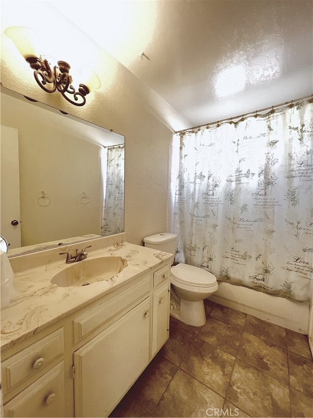 full bathroom with tile patterned flooring, shower / bath combination with curtain, vanity, and toilet