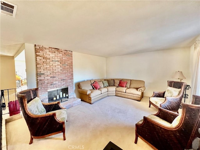 living room with light colored carpet and a brick fireplace