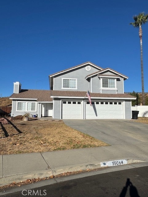 view of property with a garage