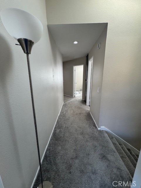 corridor featuring carpet flooring