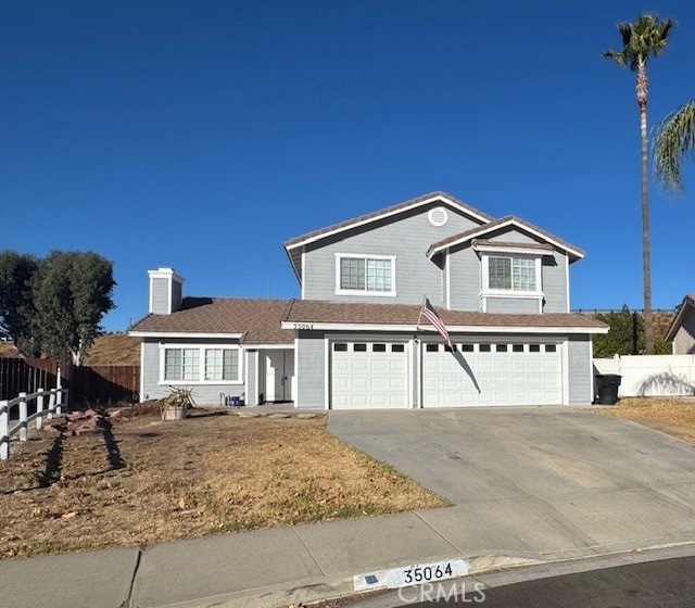 front facade with a garage