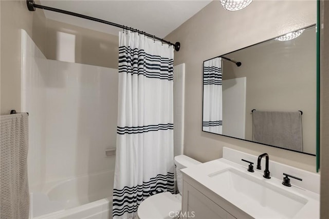 full bathroom with shower / bath combination with curtain, toilet, and vanity