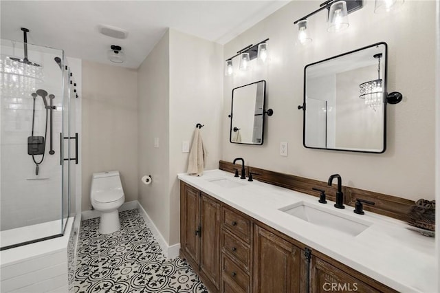 bathroom with tile patterned flooring, toilet, an enclosed shower, and vanity