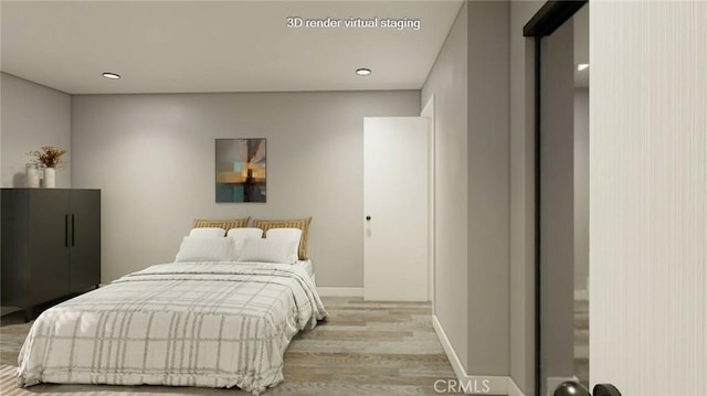 bedroom featuring light hardwood / wood-style floors