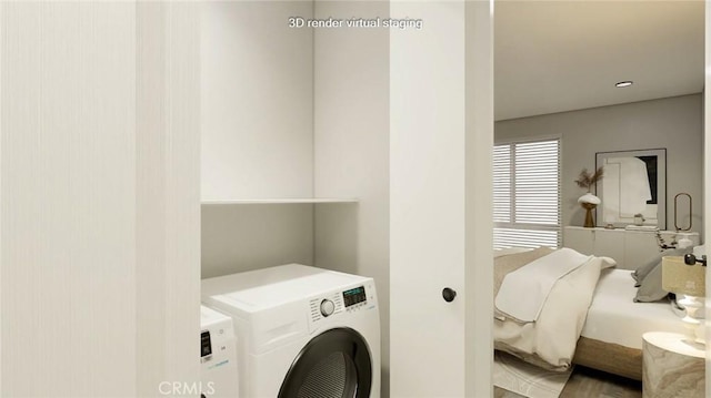 washroom featuring washer and clothes dryer