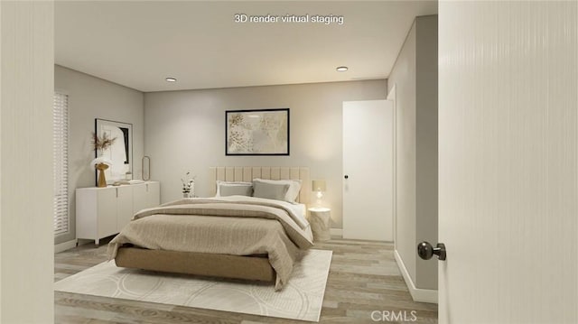 bedroom featuring light wood-type flooring