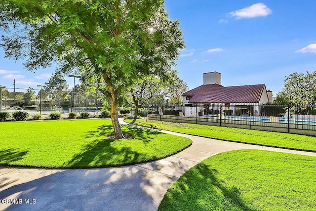 view of community featuring a lawn