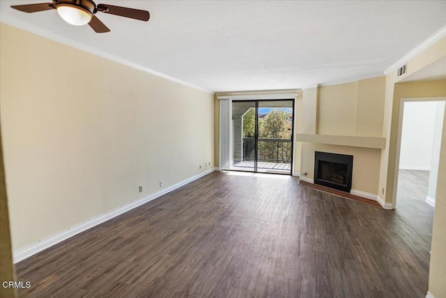 unfurnished living room featuring ceiling fan, ornamental molding, and dark wood-type flooring