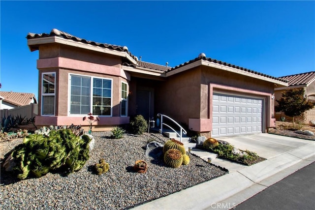 ranch-style house featuring a garage