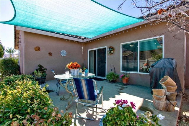 view of patio / terrace featuring a grill